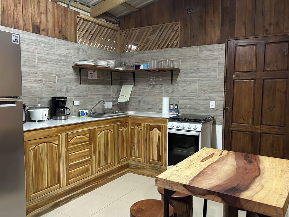 Plenty of counter top prep space, stove, pots & pans, and utensils included. 