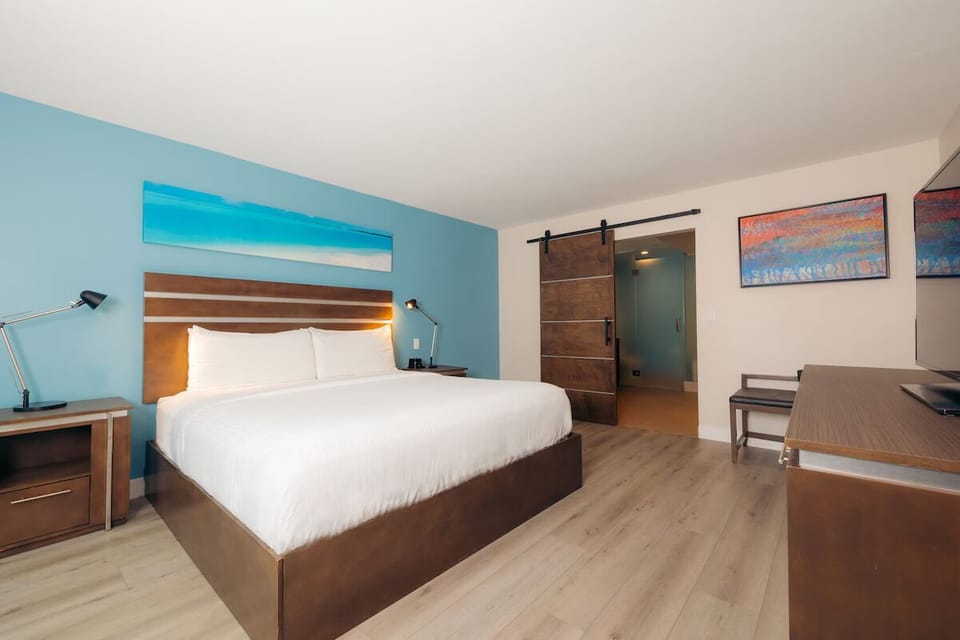 Settle in and stretch out in a bright, modern king room.