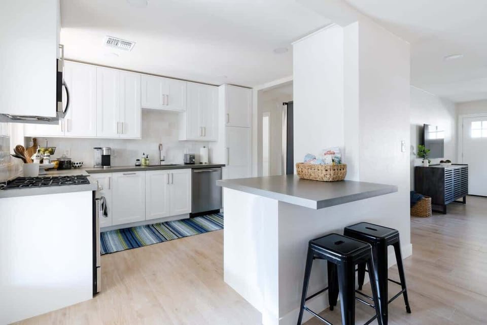 Bright kitchen - fully stocked with all necessities.