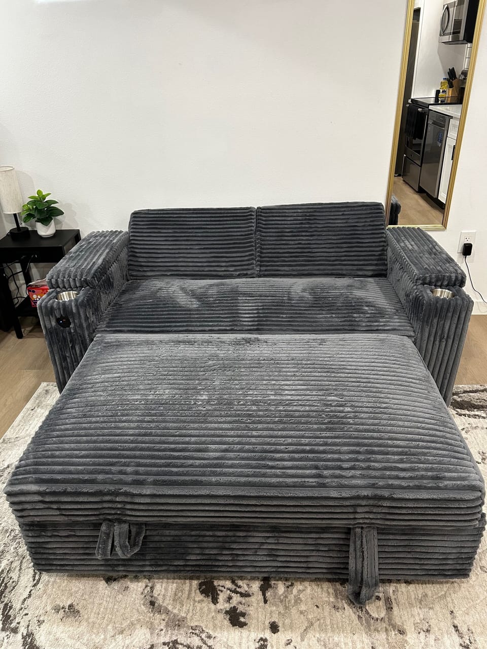 Lounge on comfy couch with free Peacock TV.