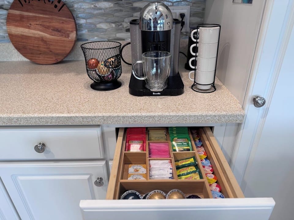 Coffee and tea station with both a Nespresso and Keurig machine to choose from