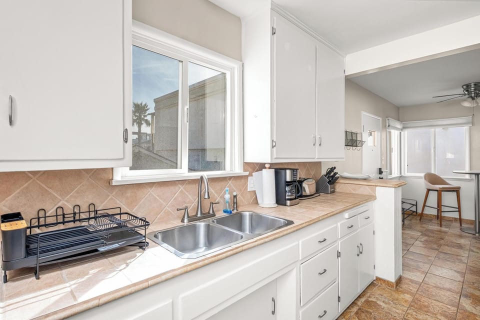 Kitchen | Coffee Machine, Toaster, and Microwave At Your Disposal