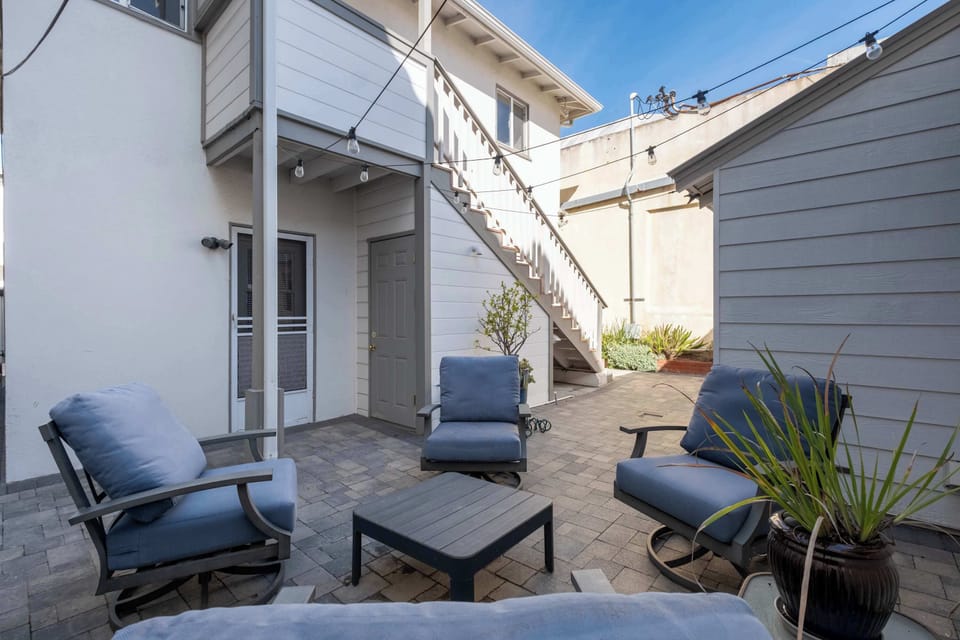 Upstairs is the entrance to the unit. This is a shared outdoor area with the other 1br. 