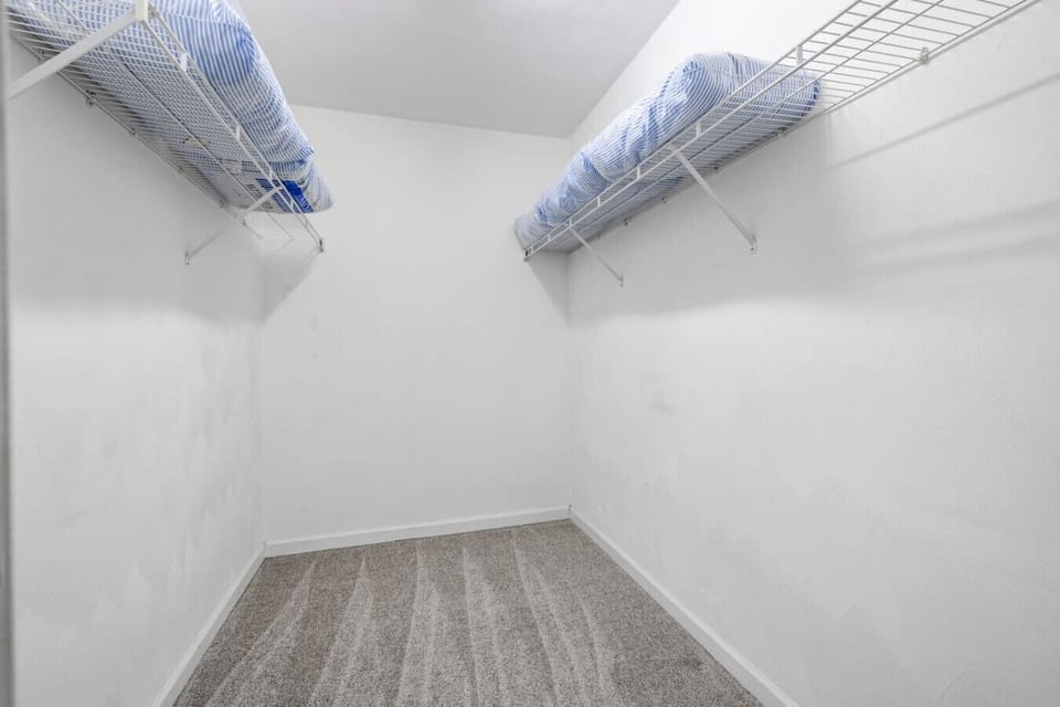 A walk-in closet offer plenty of room for stowage and all your belongings without feeling cluttered.