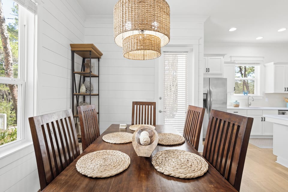 Cozy dining space with rustic charm and warm lighting.