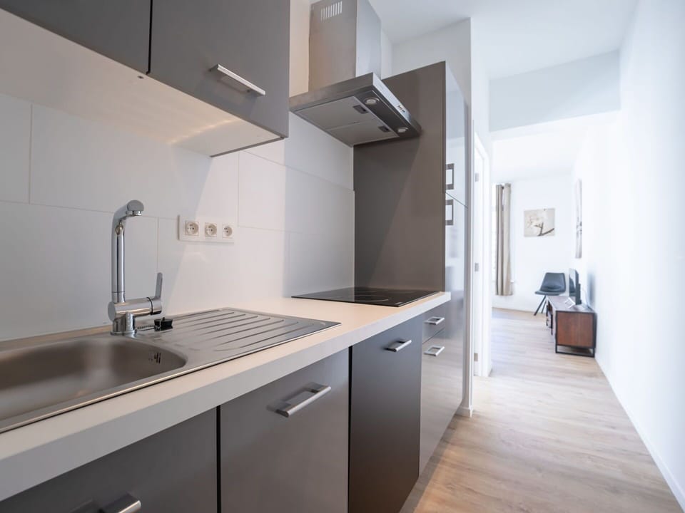 Kitchen, Countertop, Interior Design, Kitchen Appliance, Flooring, Major Appliance, Cabinetry, Furniture, Wood, Floor