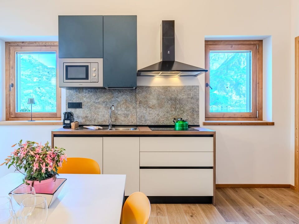 Interior Design, Kitchen, Furniture, Flooring, Wood, Countertop, Ceiling, Floor, Room, Home