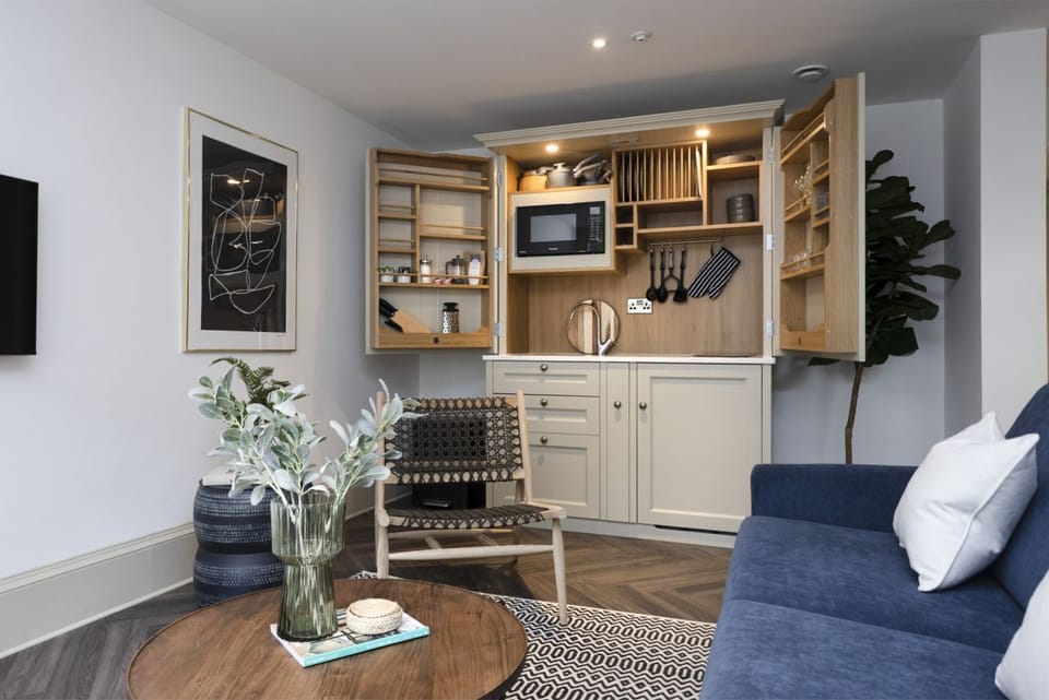 Studio with bed and kitchen