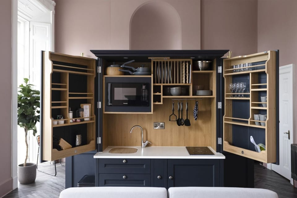 Studio with bed and kitchen