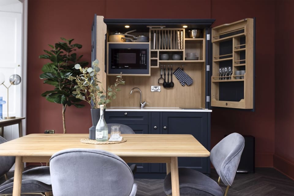 Studio with bed and kitchen