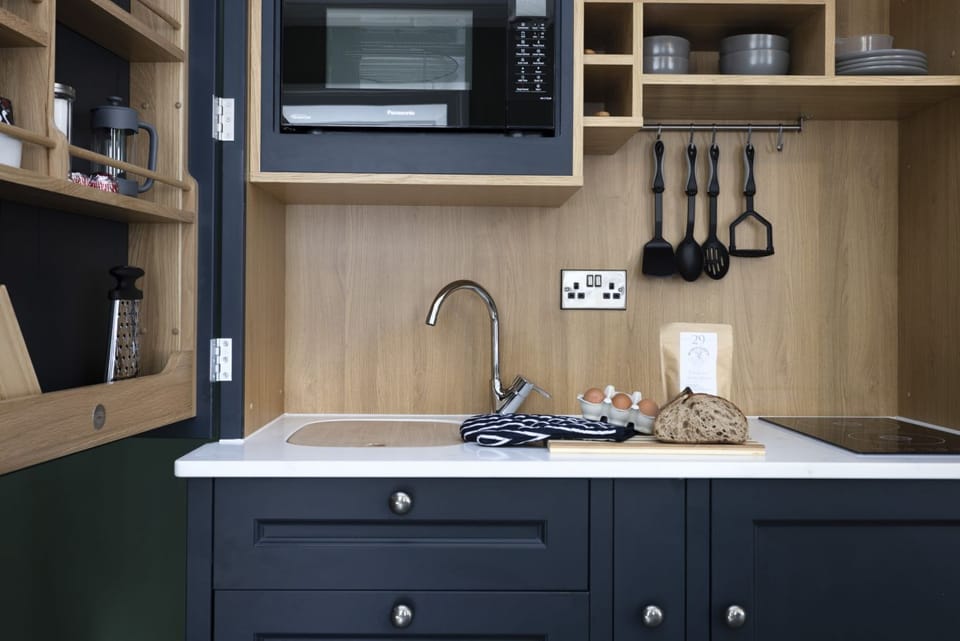 Studio with bed and kitchen