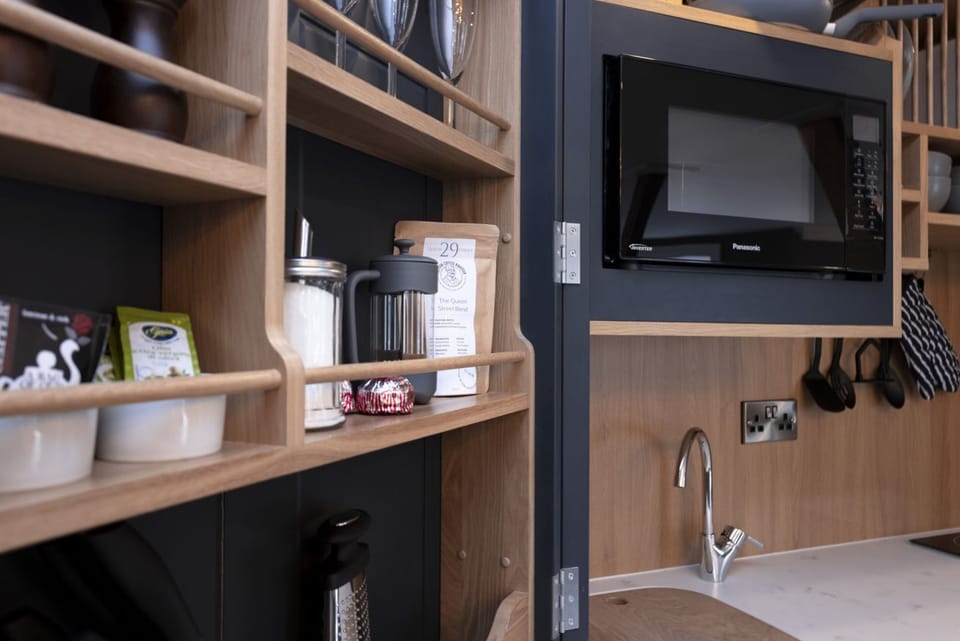 Studio with bed and kitchen