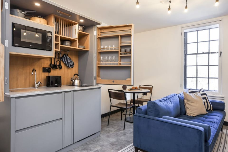 Studio with bed and kitchen