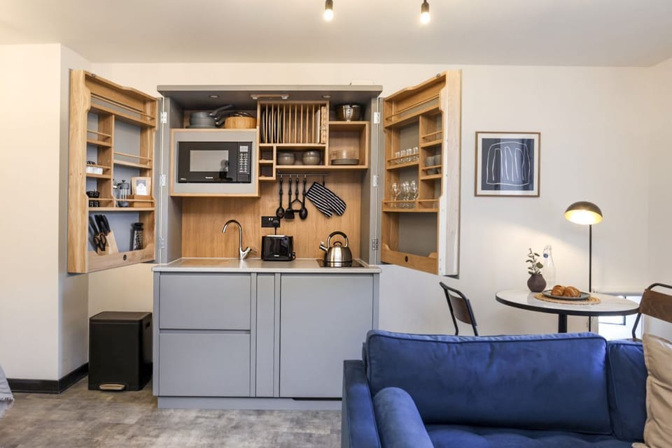 Studio with bed and kitchen