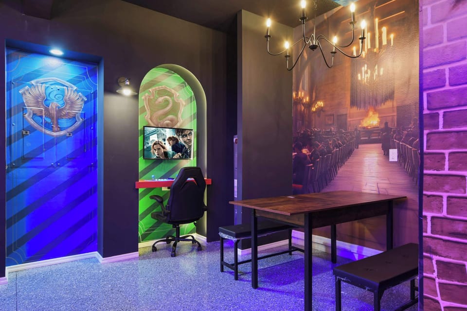 Magical gaming nook with Hogwarts house themes and Great Hall vibes!