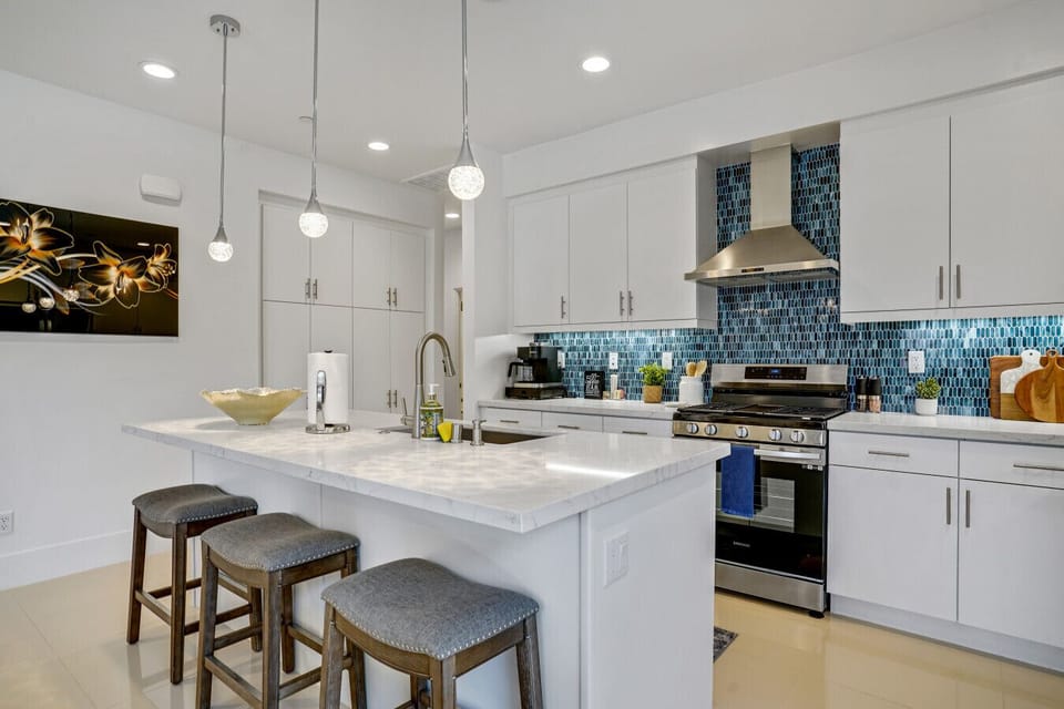 Bar stools by the kitchen your for your convenience