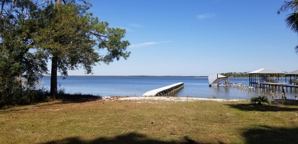 Private community bay front lot with pier