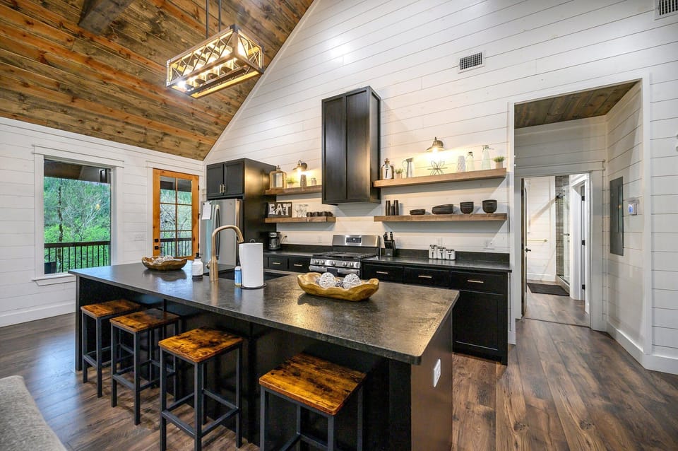 Everything you need, right at your fingertips—fully stocked kitchen and dining space for shared meals and cozy mornings.