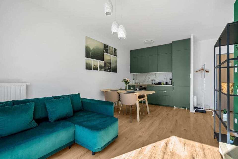 Living Room with Sofa Bed, Smart TV and Dining Table | Book Now with RENTUJEMY.COM