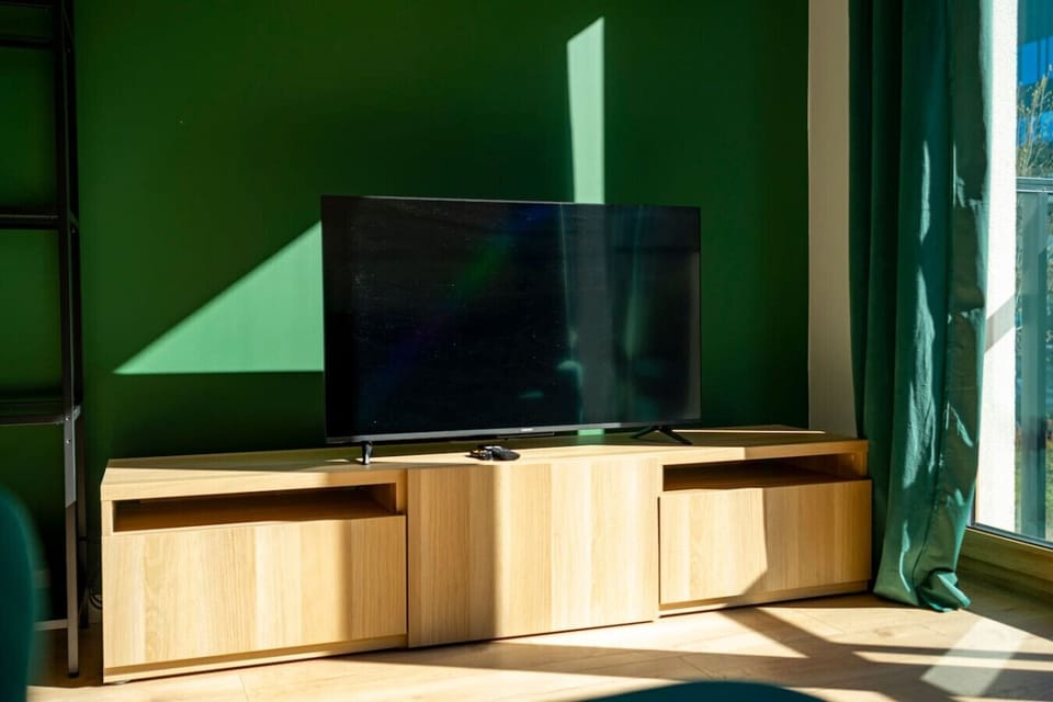 Living Room with Sofa Bed, Smart TV and Dining Table | Book Now with RENTUJEMY.COM