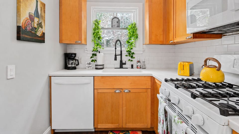 A full kitchen with gas range and everything you need to cook in.
