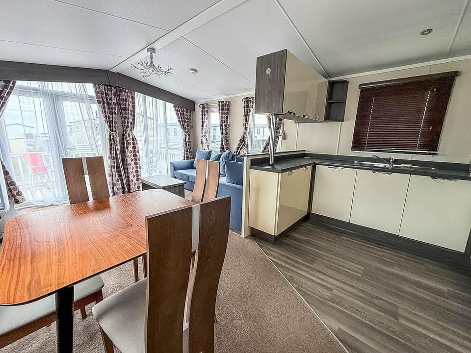 Prepare a family meal in this full kitchen whilst the children sit around the table and play board games