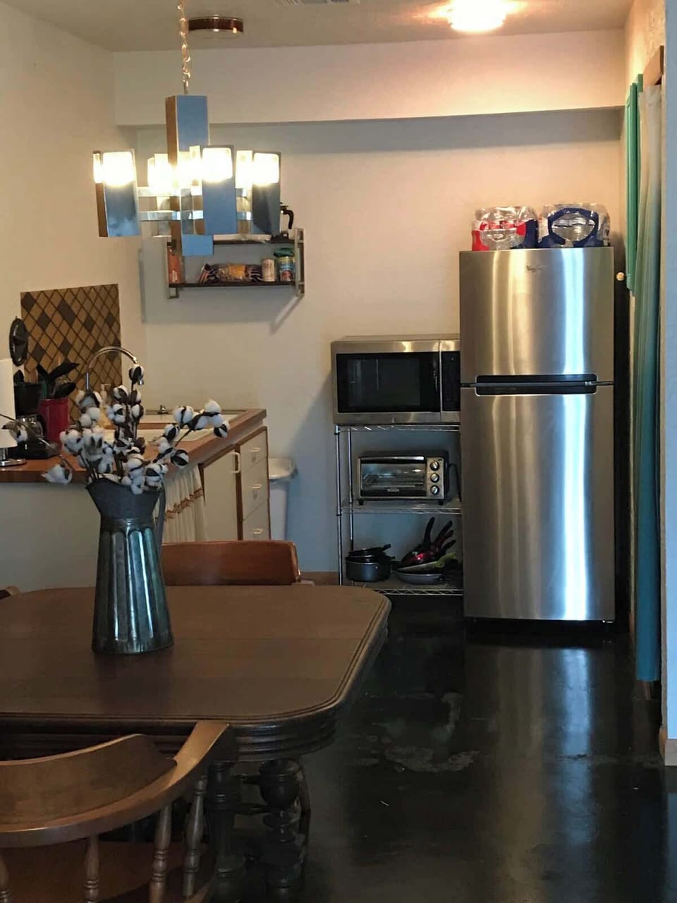 Basic kitchen  hot plate microwave refrigerator it’s cozy but beautiful to me