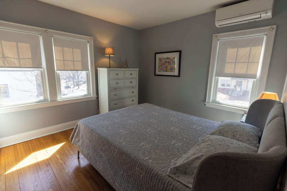 Spacious bedroom with queen bed