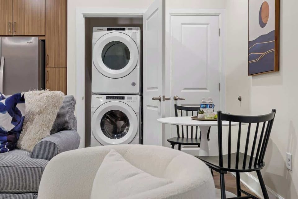 Laundry Nook: Enjoy convenience with in-unit laundry and a chic dining spot for casual meals!

