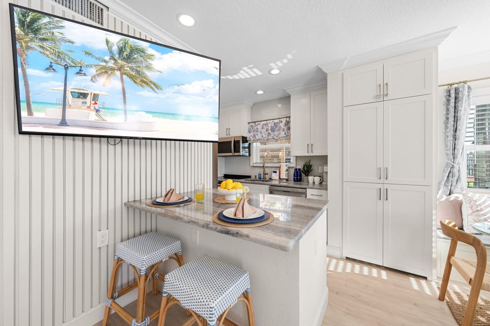 Enjoy peaceful views of the Intracoastal waterway from the comfort of the living room—an ideal backdrop for your morning coffee or evening relaxation.