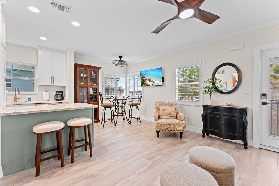 Enjoy a bright and inviting space for dining, relaxing, or planning your next beach day with family and friends.
