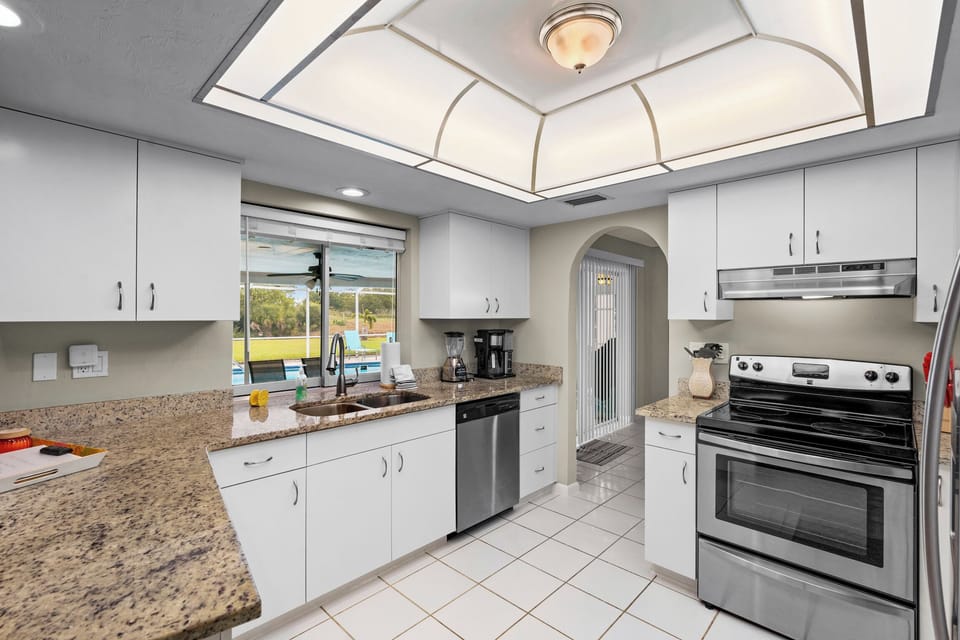 Kitchen with view of pool