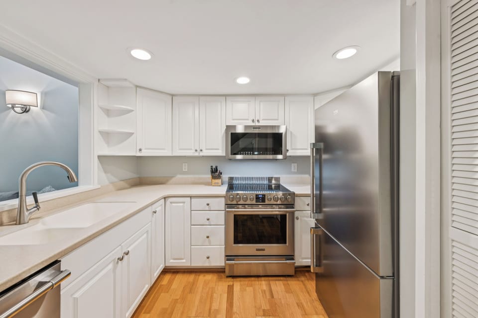 Kitchen with stainless steel appliances.