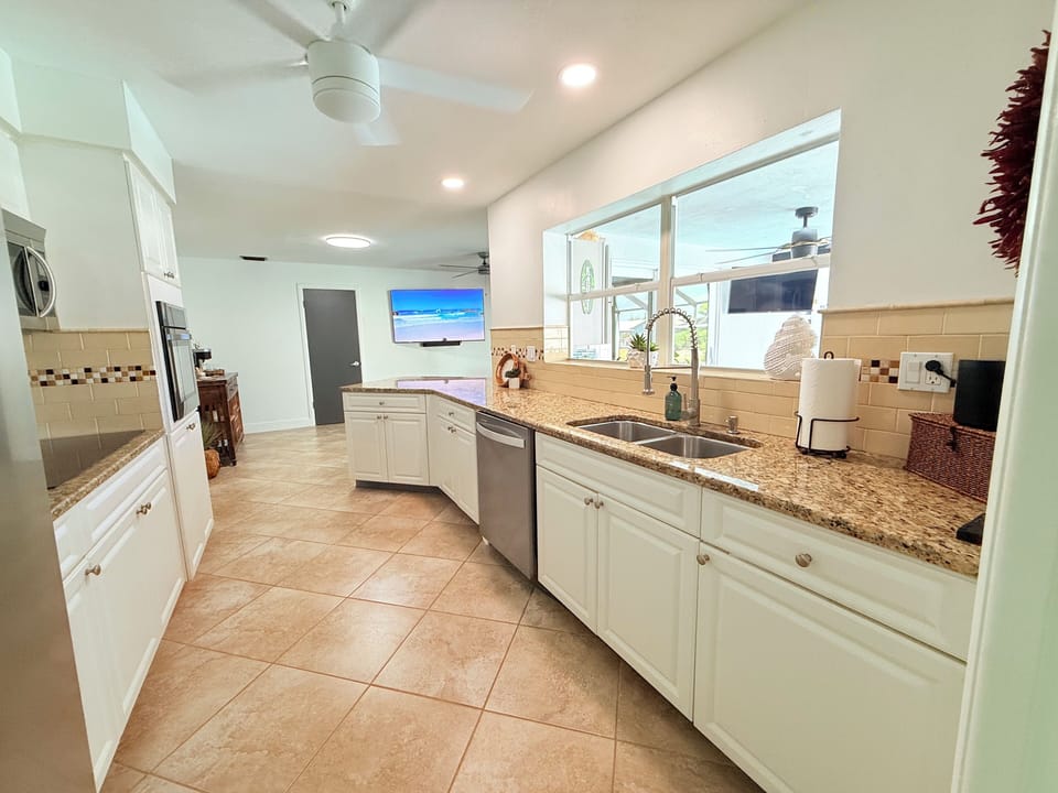 Well stocked kitchen, all new appliances. Stunning view from kitchen window.