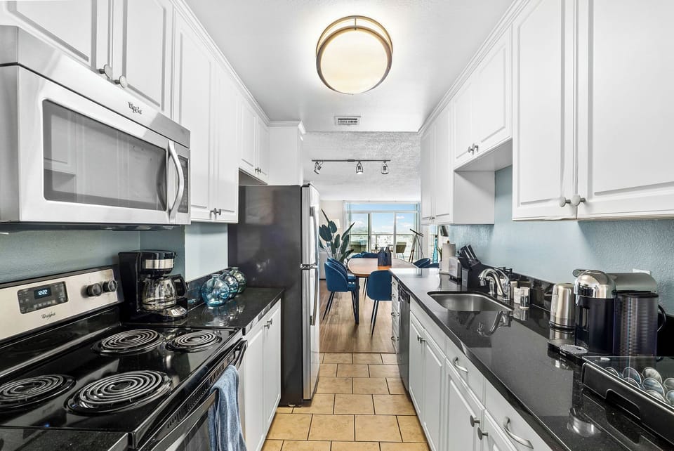 Plenty of gleaming white cabinet space for all your groceries.