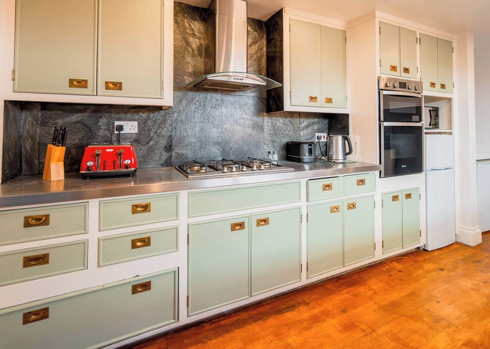Kitchen with toasters and kettle