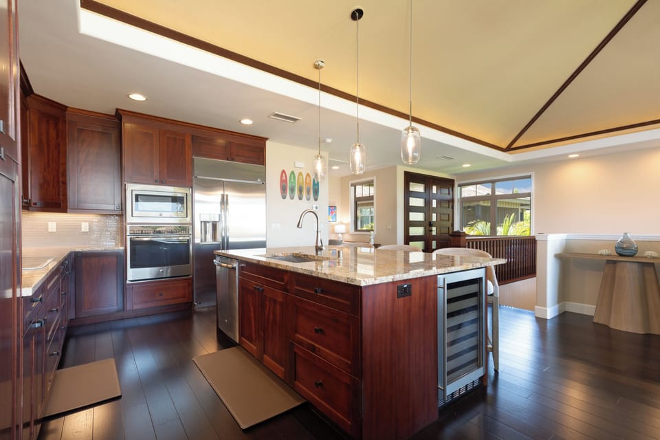 Open concept gourmet kitchen with a wonderful supply of spices, oil and essentials provided