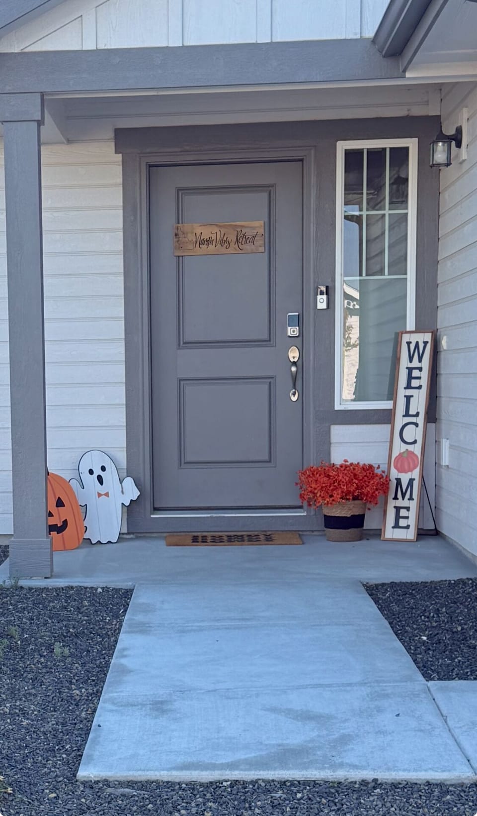 Step into fall with a hint of Halloween—cozy  charm starts at the door