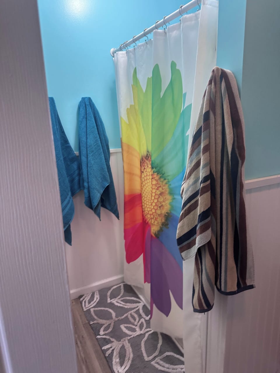 Master bedroom bathroom has a shower, no bathtub but plenty of storage.