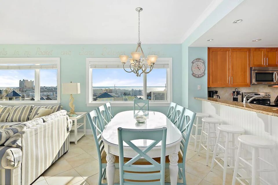 Enjoy meals at the oversized dining table with Water Views