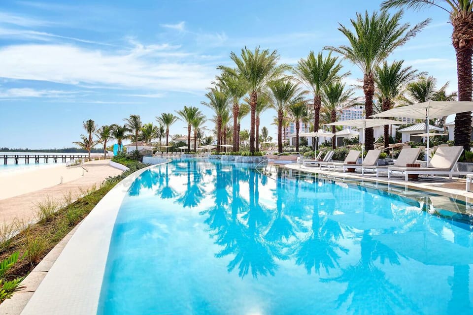 Float in crystal-blue water steps from the sandy shoreline.