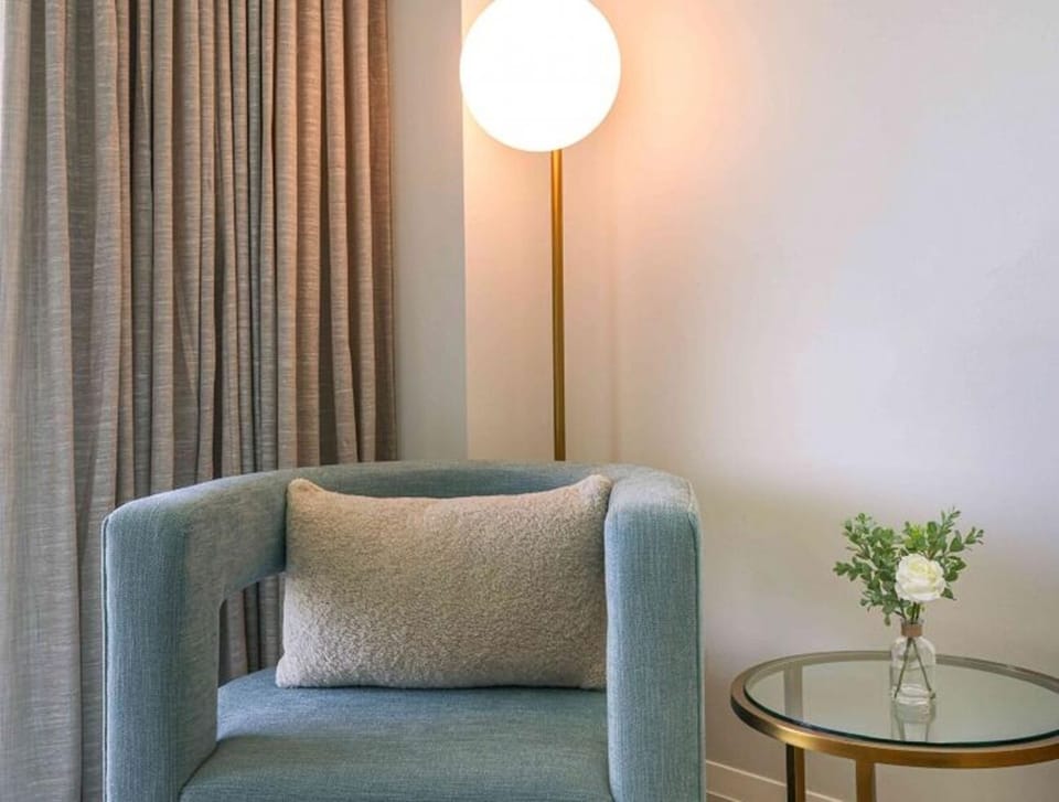 Curl up in the cozy reading nook with soft lamplight.