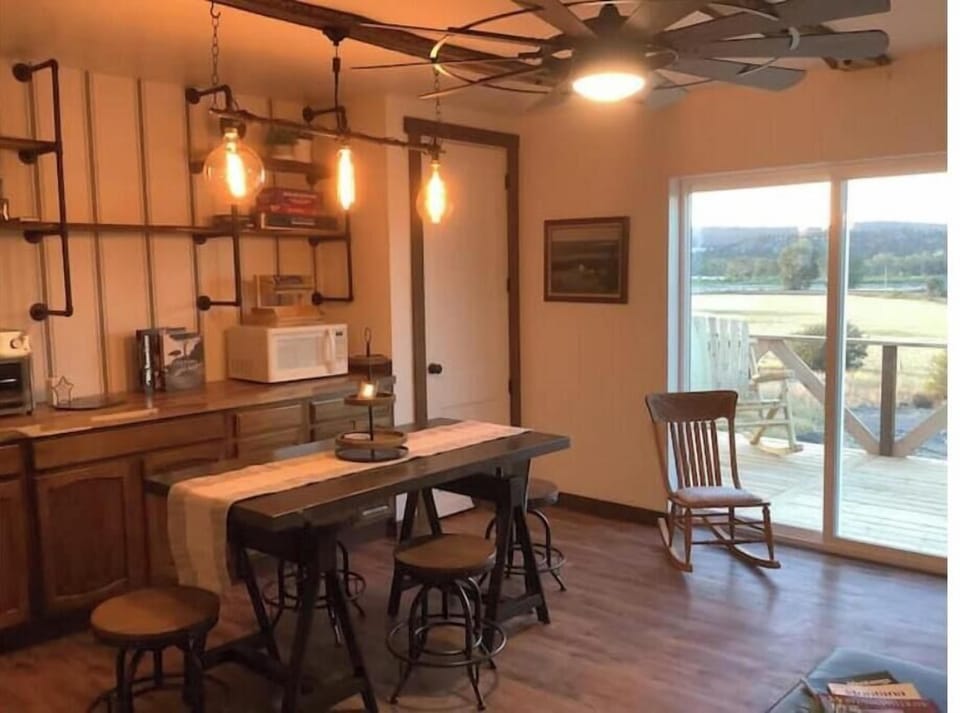 Open living/dining with piano, games, puzzles and smart TV.
