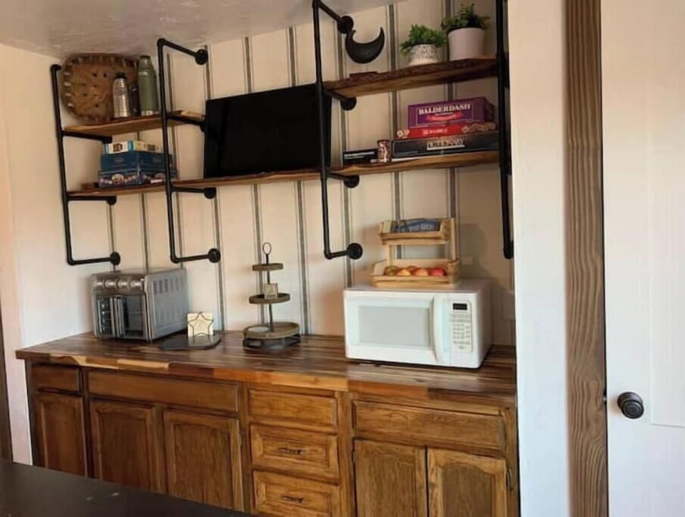 Smart TV, microwave and toaster oven.
