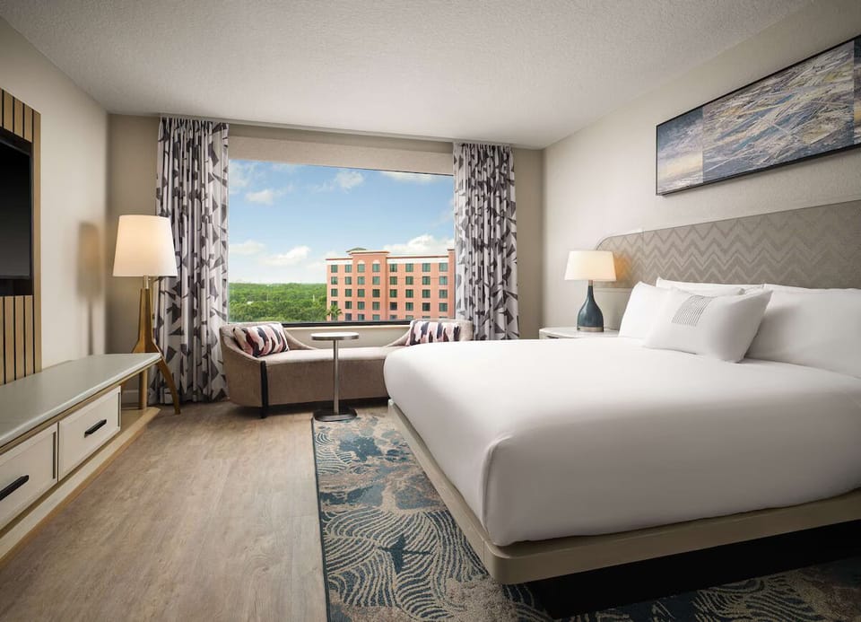 Wake up refreshed in crisp linens with sunny views.