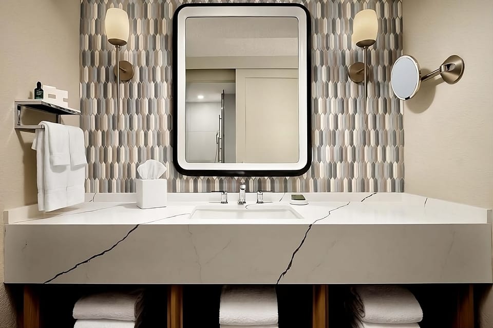 Get ready easily with bright lighting and generous counter space.