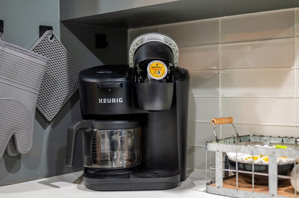 Coffee Delight: Savor every sip brewed by our convenient coffee maker.
