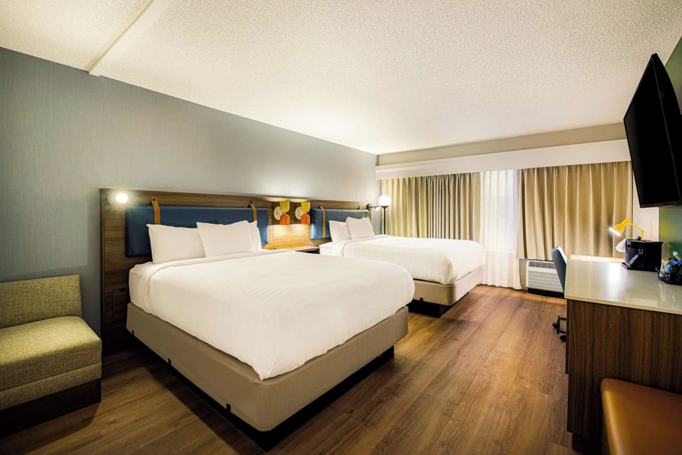 Spread out with two cozy beds for effortless group stays.