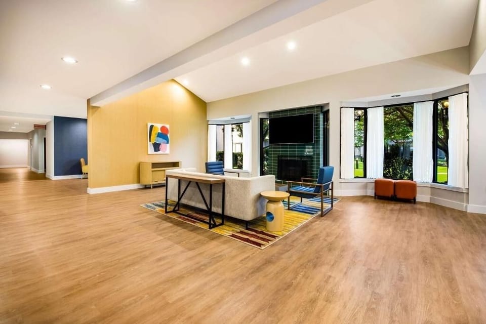 Spread out in the airy lobby lounge with cozy, modern seating.