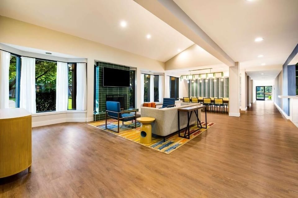 Unwind in the airy lounge with garden views and TV.